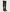 Black knee-high boots on a light gray background