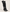 Black knee-high boots with sparkling embellishments on a light gray background